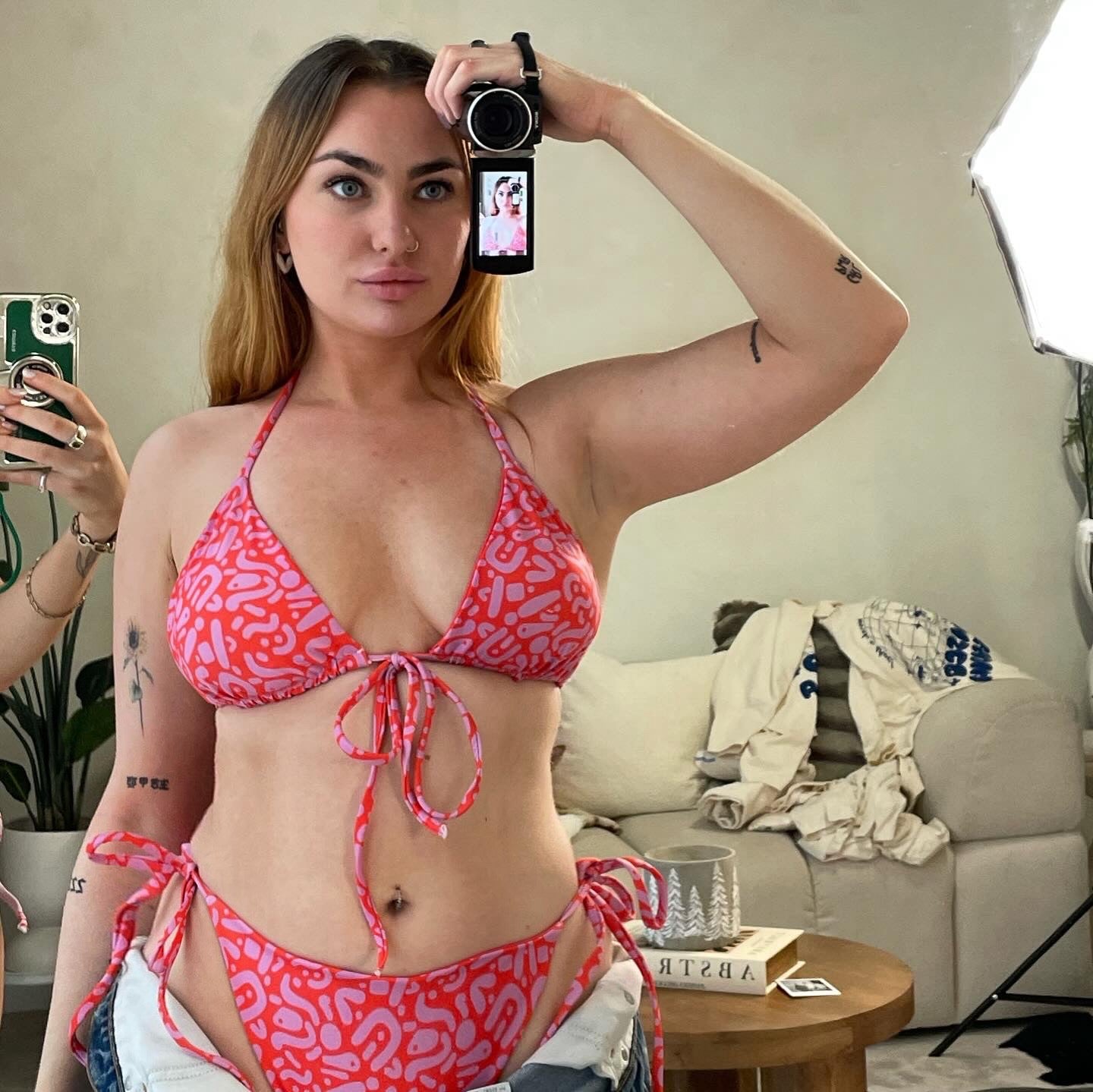 Sustainable Ruby Reef Bikini Set top in red and pink geometric pattern made with recycled plastic. Available in a range of sizes from 2XS to 6XL. Long lasting bikini, multiple ways to wear and buttery soft fabric. Made to order, just for you