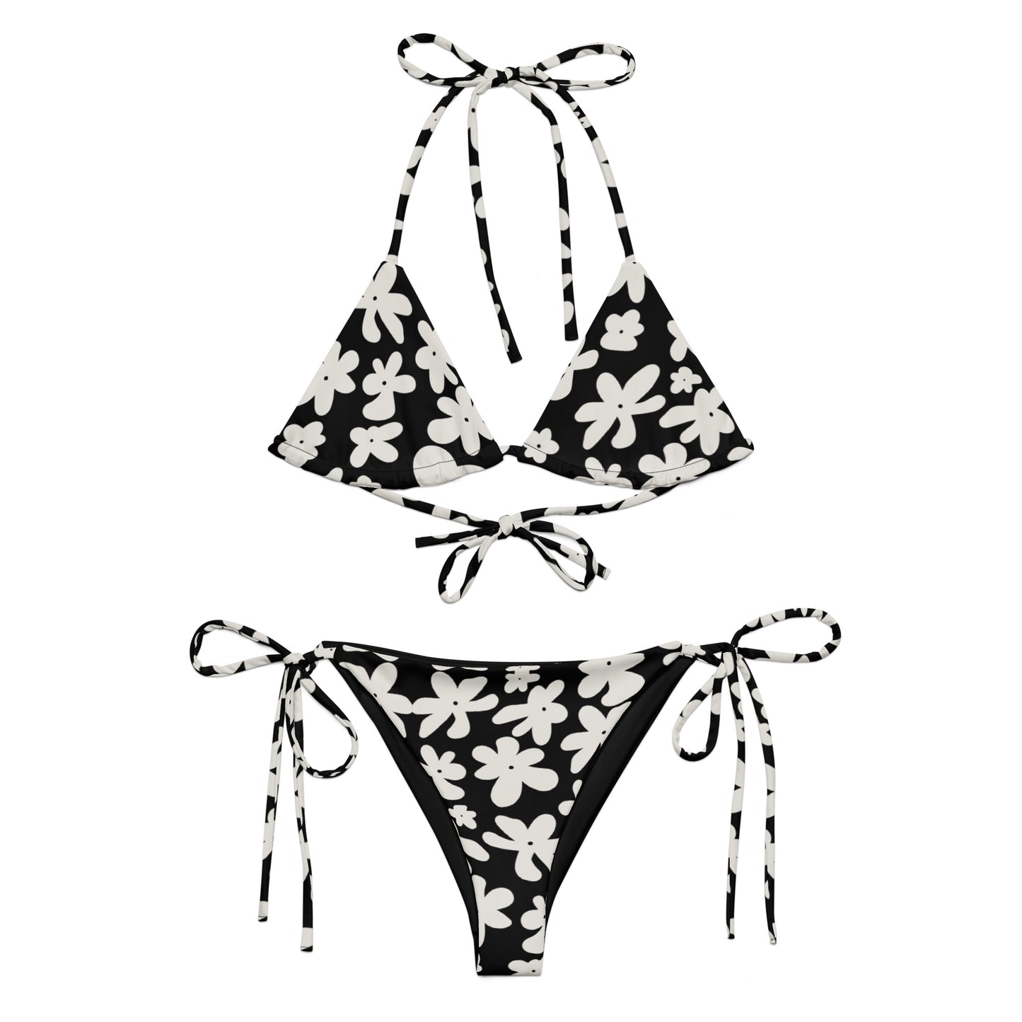 A stylish and comfortable bikini set called the Midnight Flower Bikini Set, made from high-quality, soft, and stretchy recycled material with UPF 50+ sun protection. This eco-friendly bikini set is perfect for swimming, sunbathing, or poolside lounging. I