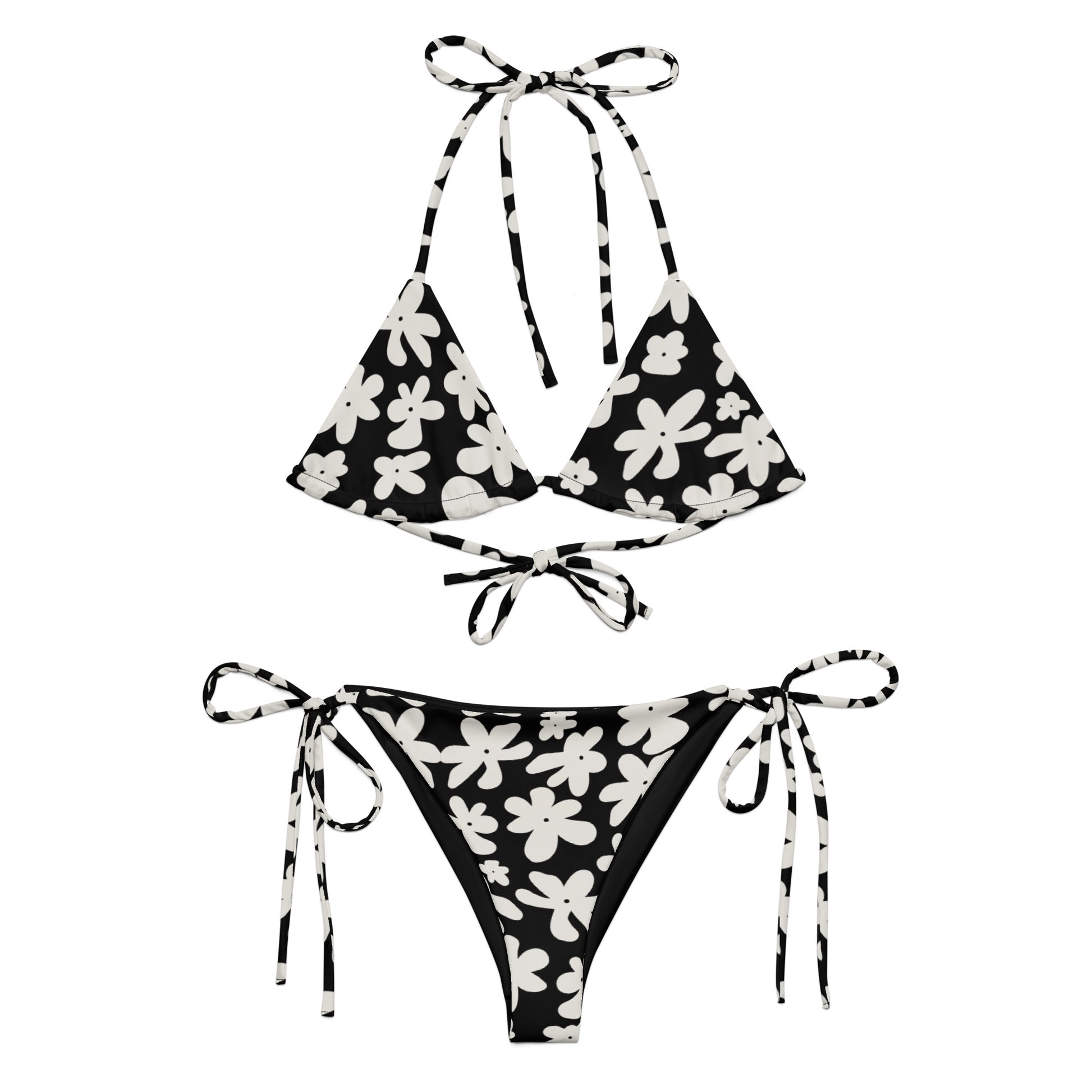 A stylish and comfortable bikini set called the Midnight Flower Bikini Set, made from high-quality, soft, and stretchy recycled material with UPF 50+ sun protection. This eco-friendly bikini set is perfect for swimming, sunbathing, or poolside lounging. I