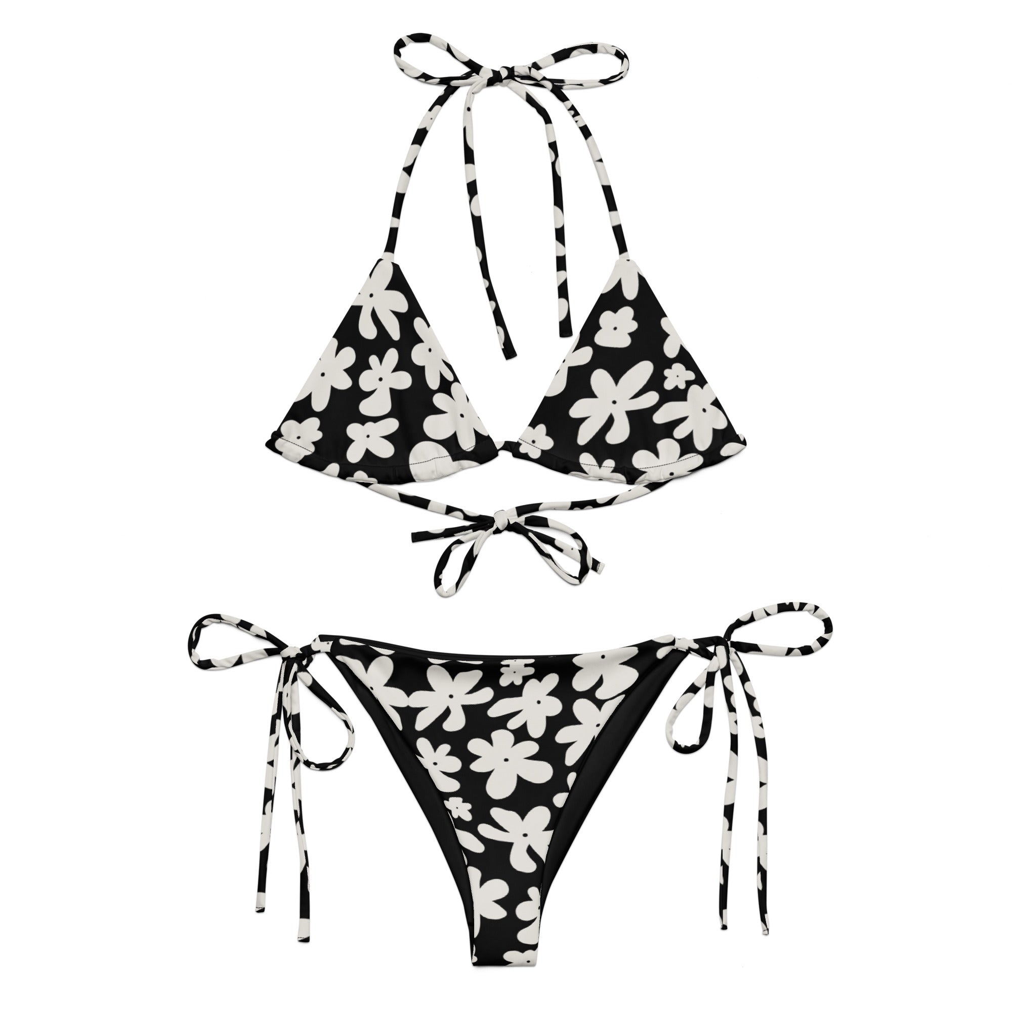 A stylish and comfortable bikini set called the Midnight Flower Bikini Set, made from high-quality, soft, and stretchy recycled material with UPF 50+ sun protection. This eco-friendly bikini set is perfect for swimming, sunbathing, or poolside lounging. I